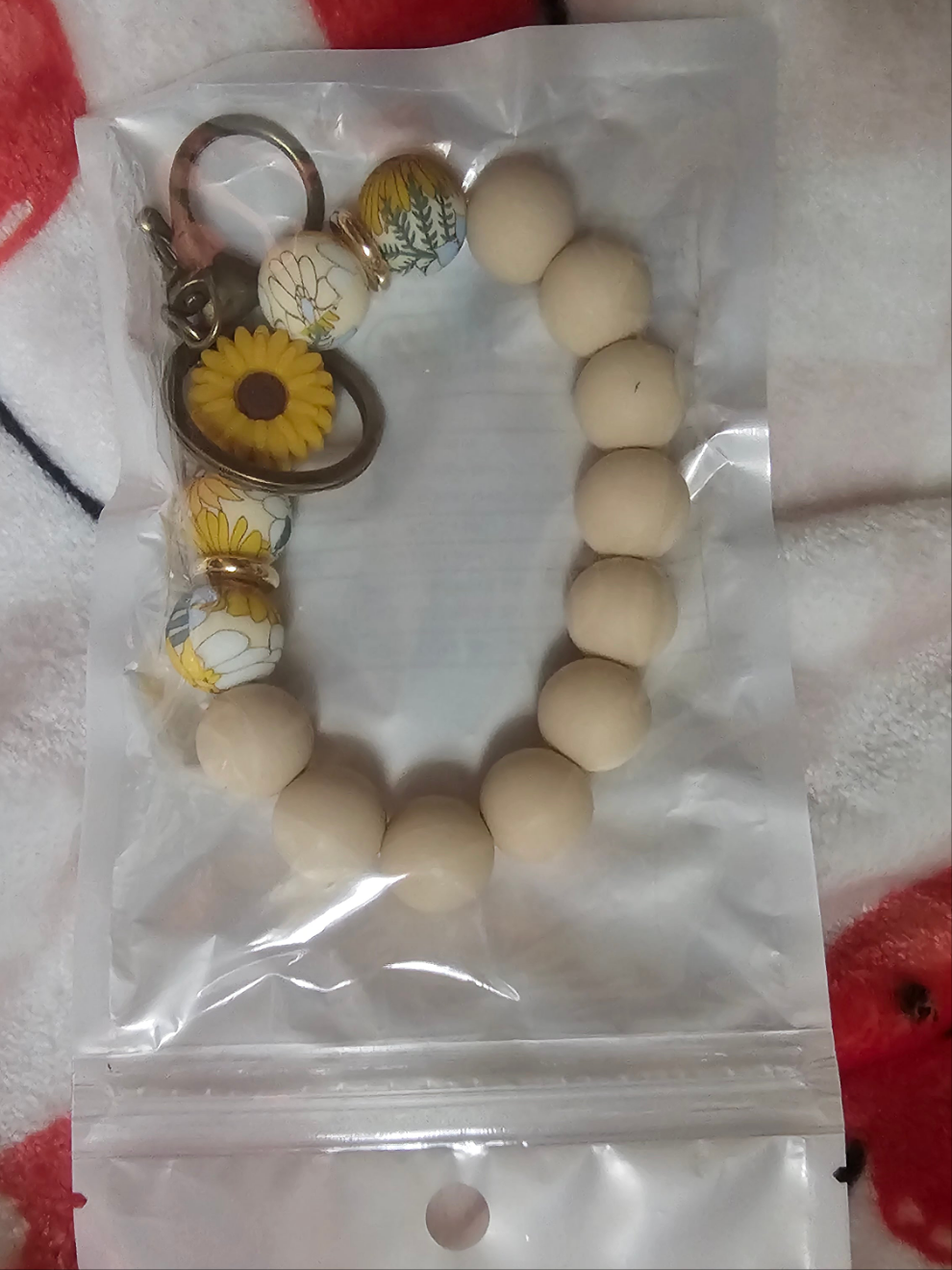 Tan flower wristlet