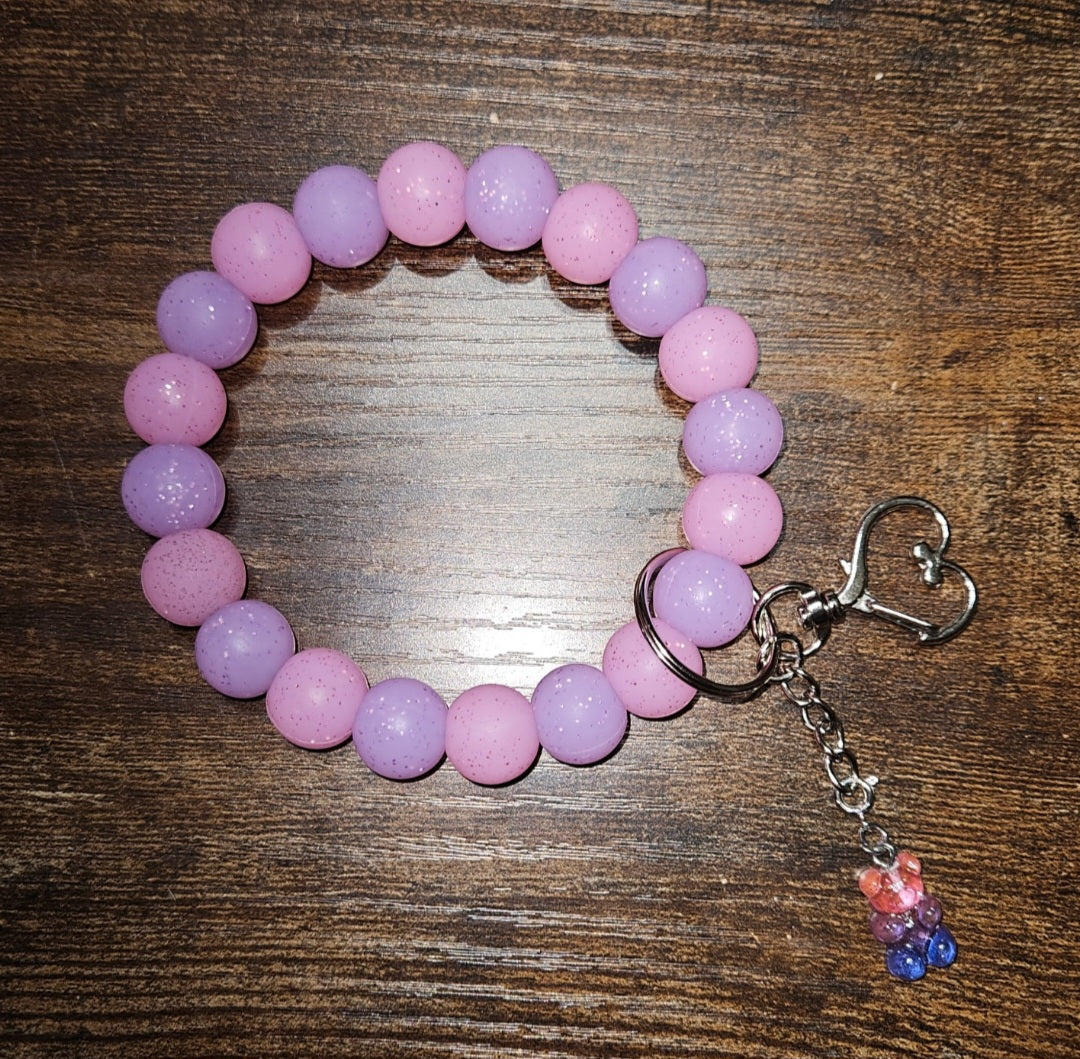 Pink and Purple 20 Bead Wristlet with Pink, Purple, and Blue Beads, Pink, purple, and blue bear charm. Heart Shape Design, Keychain Attachment, Keychain Attachment